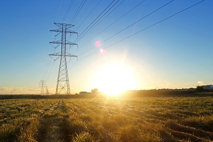 High Voltage Tower on Sunset, Electric Pylon on field